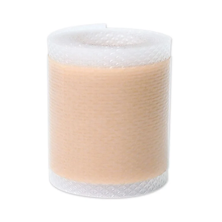 Operazio osteko babes-babesa larruazal koloreko orbain-adabakia